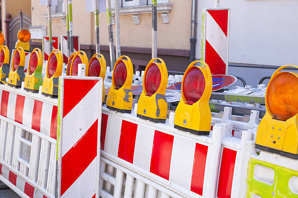 istock A red plastic construction fence in the city. 2229217994