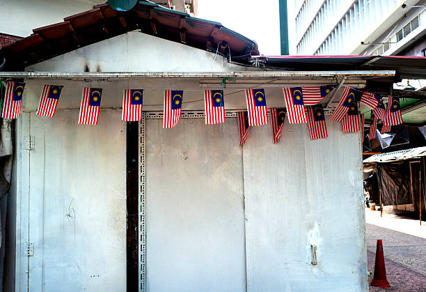 istock Small Building Decorated with Malaysian Flags 2229225412