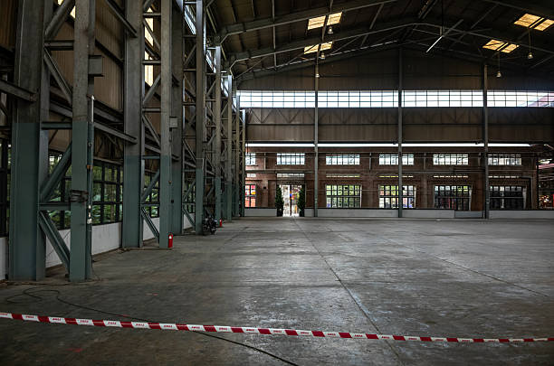 istock Empty Industrial Hall with High Ceilings and Barrier Tape 2229225616