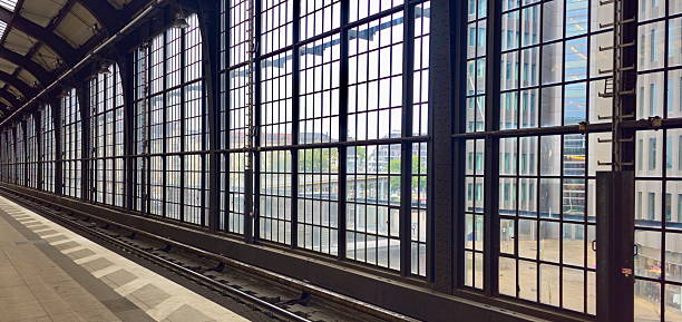 istock Modern Railway Station Platform With Large Glass Panes Reflecting City Views Friedrichstrasse 2229228932