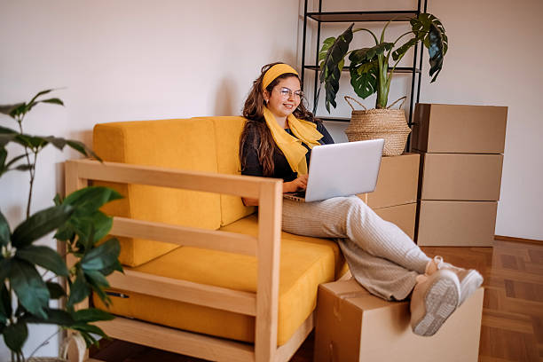 istock People moving in new apartment and using wireless technology 2229229893
