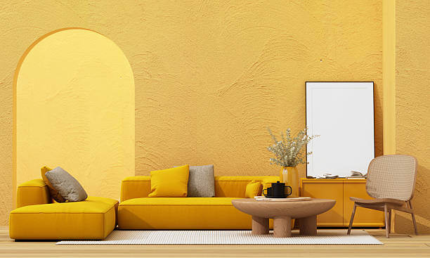 istock Modern yellow sofa with wooden coffee table, stylish decor, and empty picture frame, perfect for artwork mockup in cozy living room. 3d rendering. 2229230089