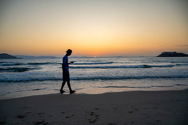 istock Evening Walk on a Greek Island Beach 2229232140