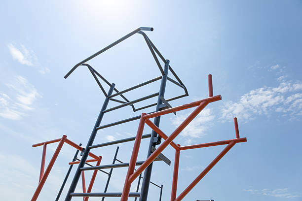 istock Bright sunlight shines on outdoor fitness equipment, featuring various bars and structures ideal for strength training and exercise 2229241909