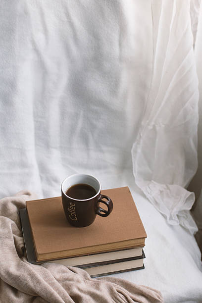istock Simple composition of indoor relaxation with coffee and books. 2229246908