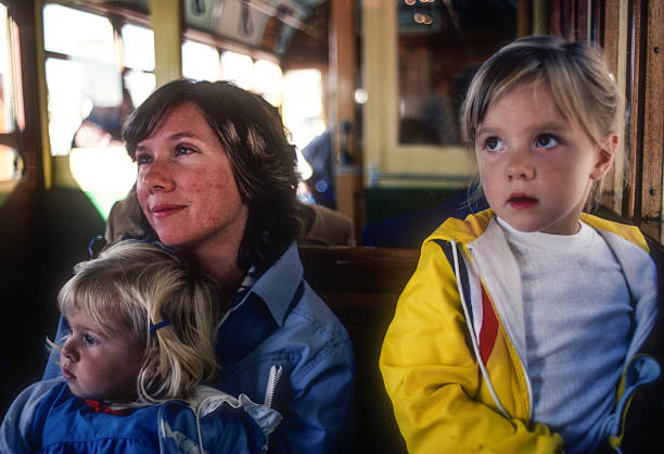 istock Seattle - Mother & Daughters on Streetcar - 1983 2229247011