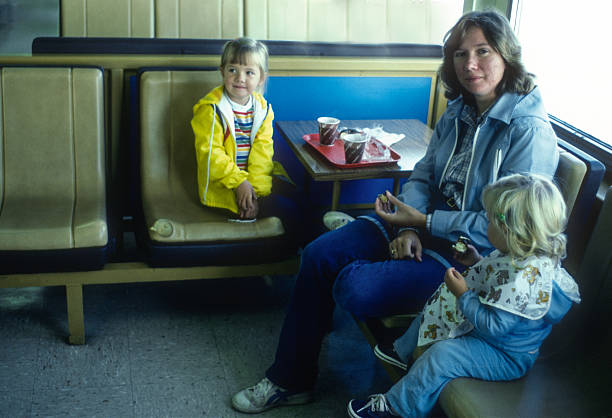 Seattle - Having Snack on the Ferry - 1983. Scanned from Kodachrome 25 slide.