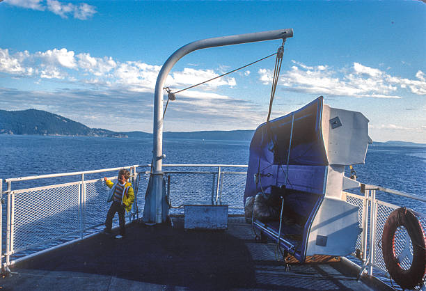 istock Puget Sound Ferry - Girl Explores the Deck - 1983 2229247268