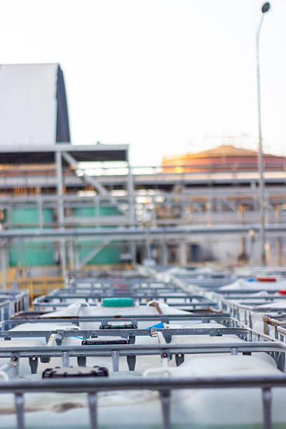 istock Industrial landscape featuring storage tanks and containers in a chemical plant setting under a soft morning light creating a sense of order and logistical capability with a touch of environmental 2229249247