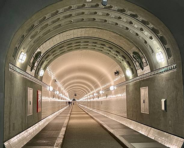 The Elbtunnel was used by cars to cross the Elbe River. Nowadays only people Walk throu it.