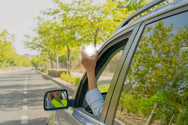 Antalya, Turkey - September 11, 2025: Top view of black iPhone 16 Pro on blue background showing dual rear cameras