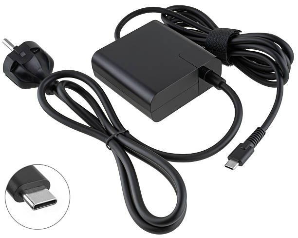 istock Laptop power adapter, black, on a white background in isolation 2229267068