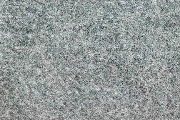 Close-up backgrounds of stacked wool felt and folded fabrics in assorted colors. Soft textile texture and diagonal layers create clean abstract backdrops and a versatile color palette for craft, sewing, packaging, web and print designs, with variations including copy space and macro detail.