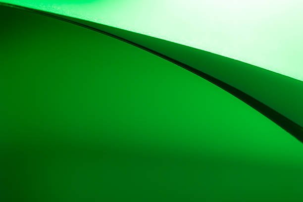 istock Colorful abstract curves in shades of green and black creating a dynamic visual experience 2229281431