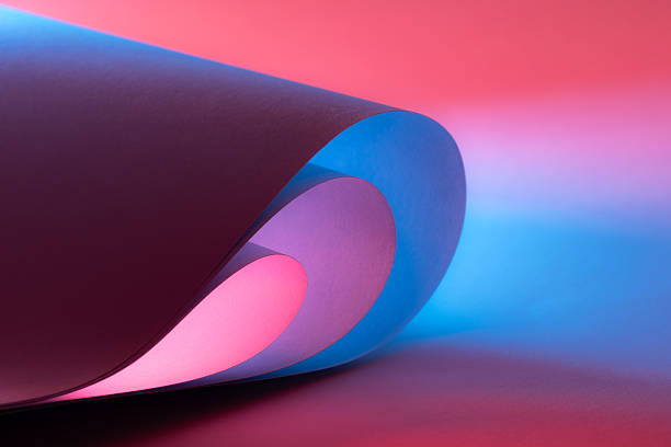 istock Colorful abstract curves in shades of blue, red and velvet tints creating a dynamic visual experience 2229281461