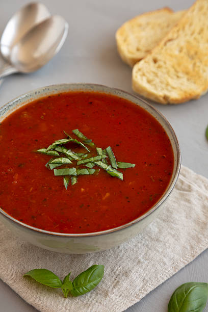 istock Homemade Tomato Basil Soup in a Bowl, side view. Close-up. 2229283143