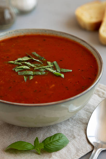 istock Homemade Tomato Basil Soup in a Bowl, low angle view. Close-up. 2229283232