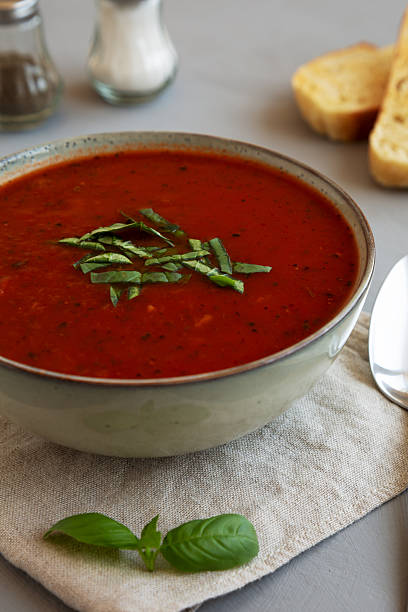 istock Homemade Tomato Basil Soup in a Bowl, low angle view. Close-up. 2229283271