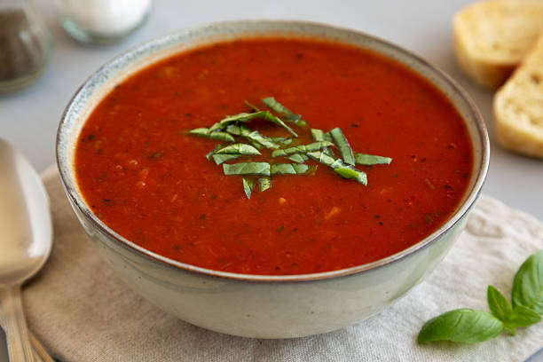 istock Homemade Tomato Basil Soup in a Bowl, low angle view. Close-up. 2229283280