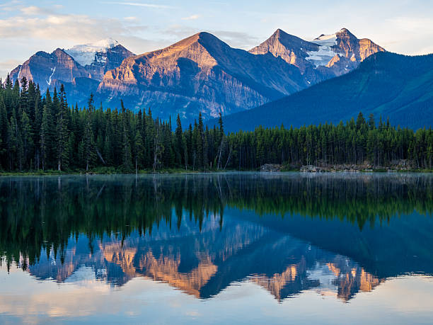 istock Golden sunrise reflection on Herbert Lake, Banff National Park 2229286469