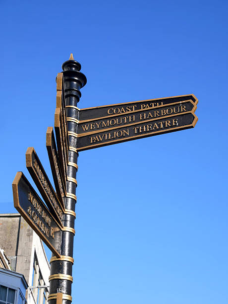 istock A pedestrian direction signpost in Weymouth, Dorset, England, UK 2229290170