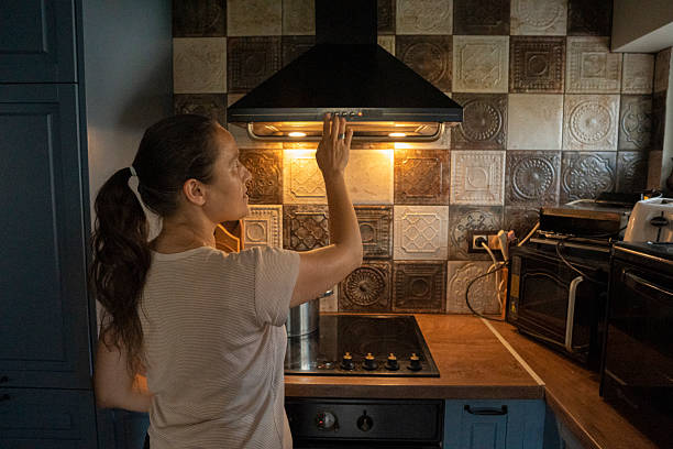 istock Using Kitchen Hood On The Stove While Cooking Homemade Food 2229299312