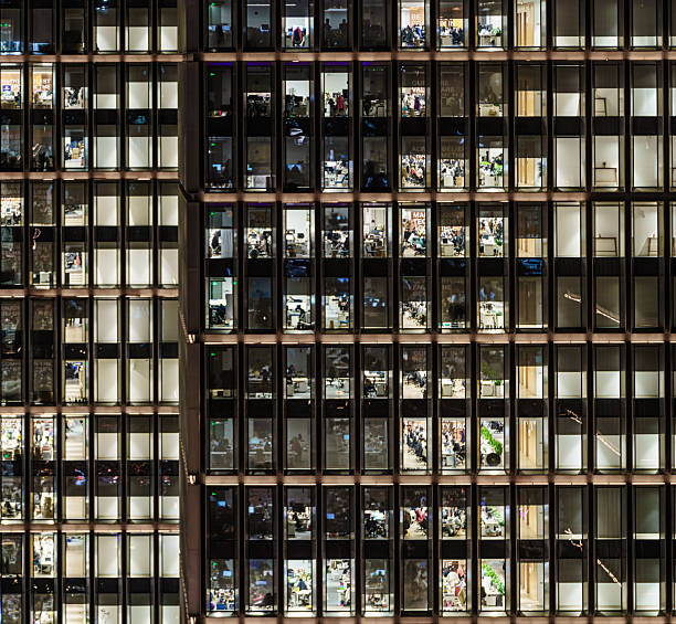 istock People Working in Office Building at Night 2229323046