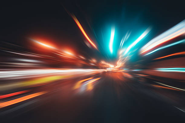 istock Car Driving in a City During Night, Motion Speed 2229323085