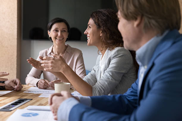 istock Positive business professionals brainstorming on project, discussing marketing strategy 2229334390