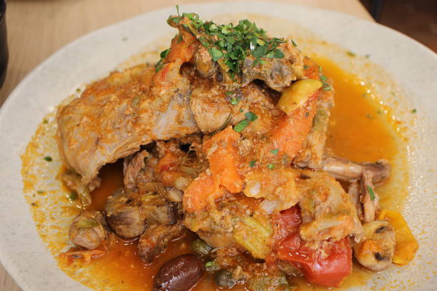 istock Maltese cuisine: stuffat tal-fenek (traditional Maltese stewed rabbit) in Valletta, Malta 2229337961