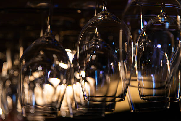 istock wine glass hanging in the bar 2229345901