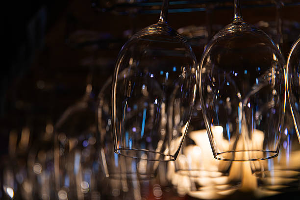 istock wine glass hanging in the bar 2229345912