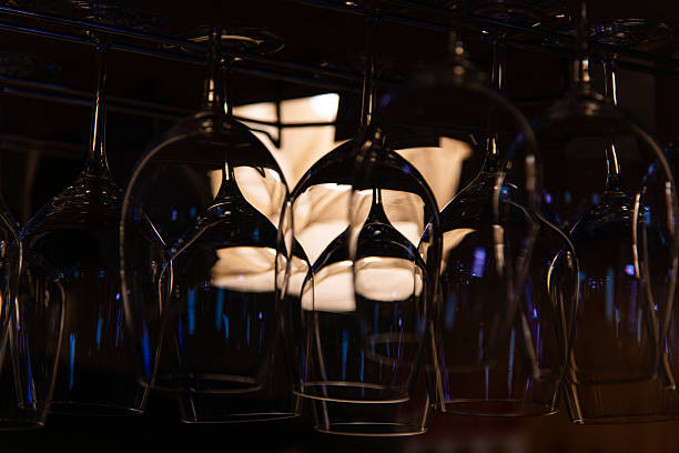 istock wine glass hanging in the bar 2229346034