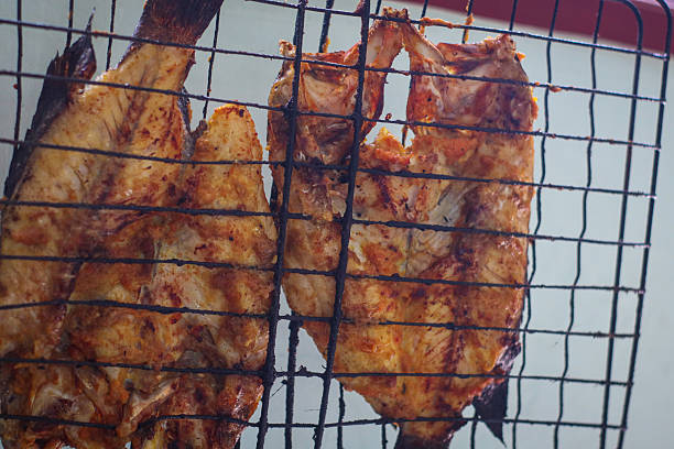 Delicious and tasty grilled fish. Asian grilled fish with delicious spices. Delicious grilled fish spices, Southeast Asia, Indonesia