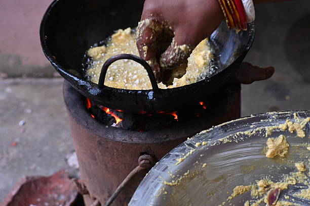 istock Onion pakora frying in iron pen. 2229346982