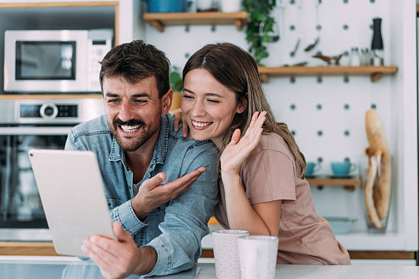 istock Couple making video call at home. 2229347199