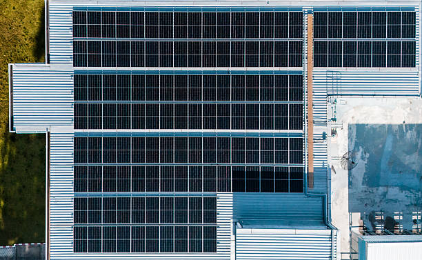 istock Energy efficient rooftop with multiple solar panels installed on a contemporary mall 2229349368