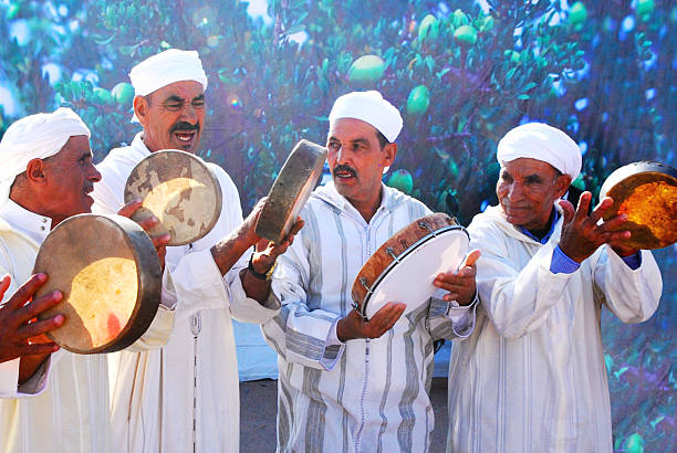 A group of Moroccan musicians playing the \