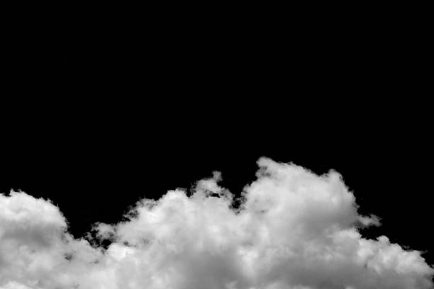 istock Isolated fluffy white clouds on black background. Design concept. Abstract clouds. Fog over the sky. Cloud or smog background. 2229351595
