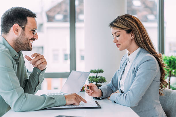 istock Business people signing a contract in the office. 2229356686