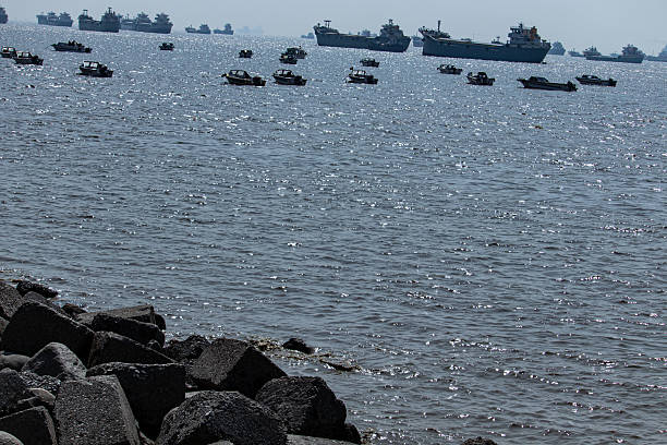 istock Soft marine tones with distant ship near Patenga. 2229358889