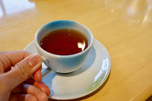 istock White tea cup with roasted green tea. 
