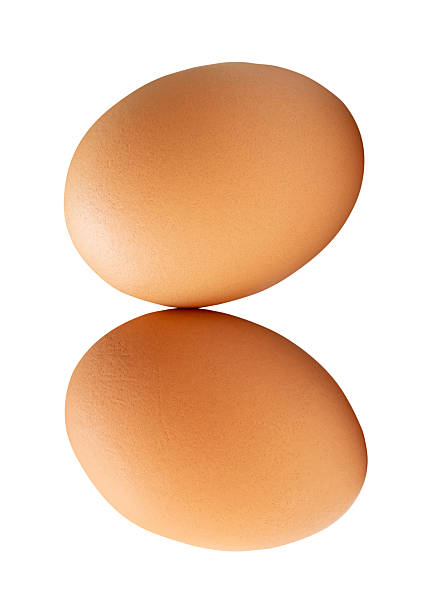 istock Top view of two fresh brown chicken eggs in stack isolated on white background with clipping path 2229366889