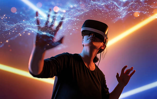 istock Woman with VR virtual reality goggles 2229367507