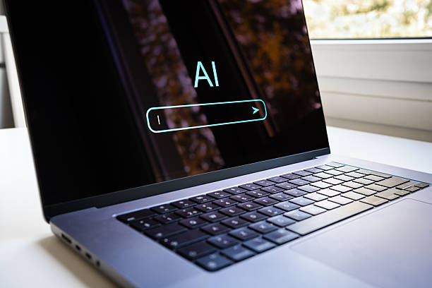 istock AI generate with prompt in laptop computer. Content, artificial text or search at home. Chatbot and digital virtual assistant model. 2229375997