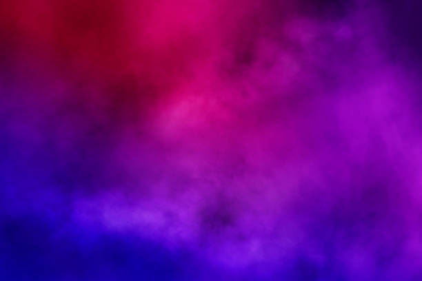 istock Colorful swirling smoke creating an abstract background with vibrant colors 2229376361