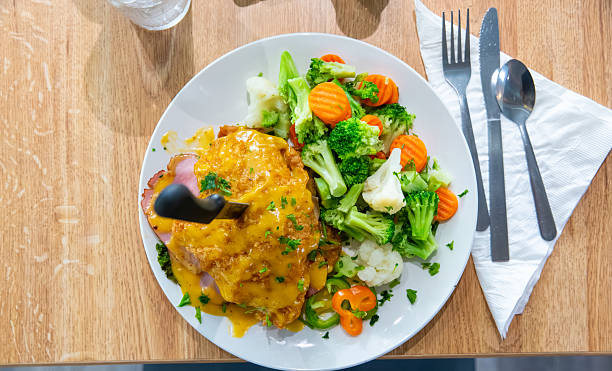 chicken_cordon_bleu served with steamed veggies