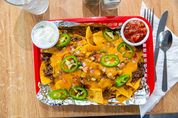 Philly Nachos, ground beef, jalepenos and cheese whiz