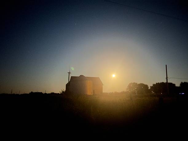 istock Sturgeon moon and farm in wind farm. 2229380330
