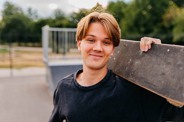 istock Portrait of a handsome skateboarder 2229387074